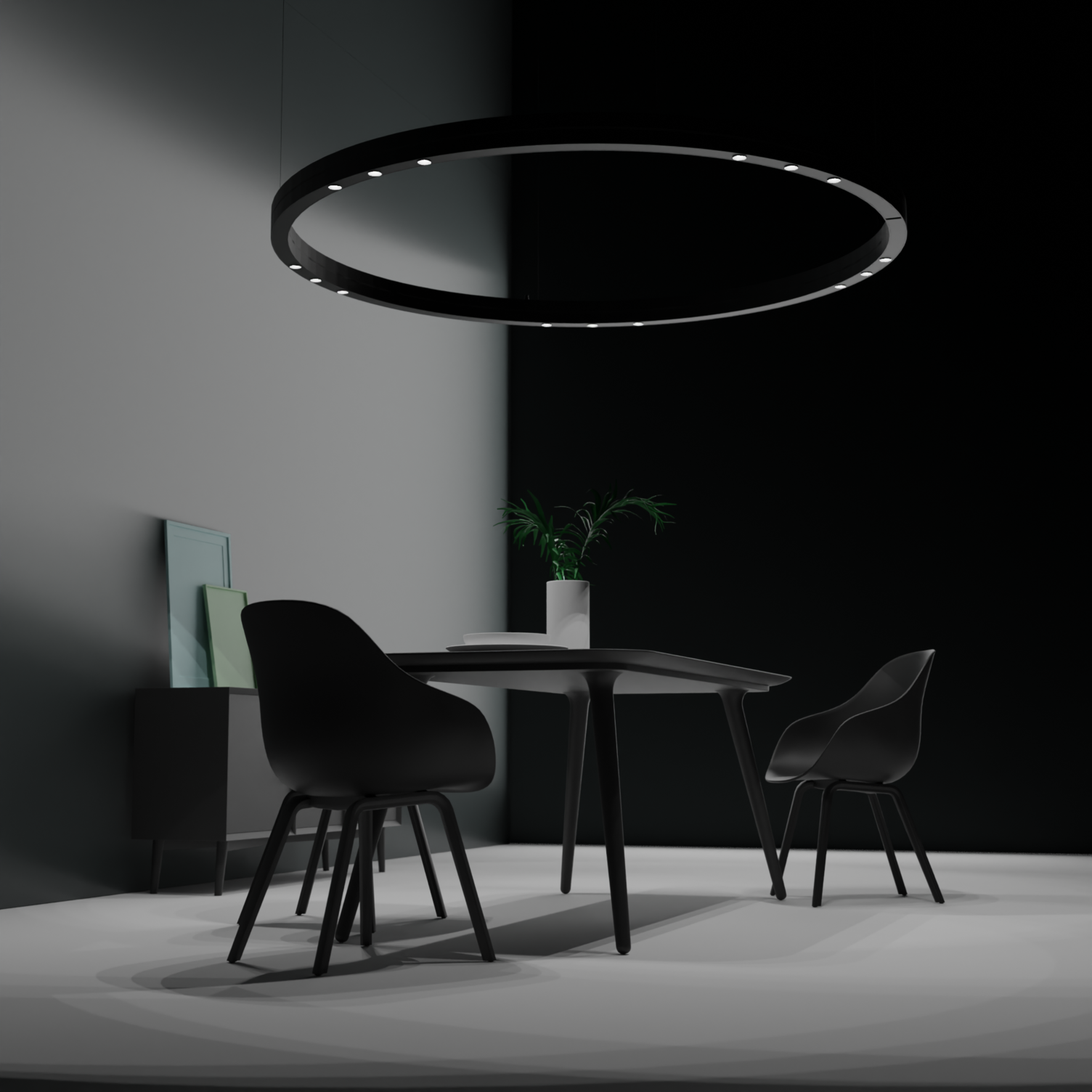 A black ring pendant light, DUETTO LENS, with round lenses arranged in groups above a black table with black chairs.