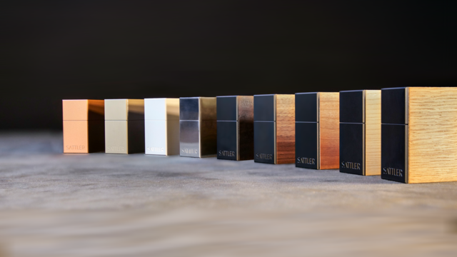 A series of various material samples arranged in a line.