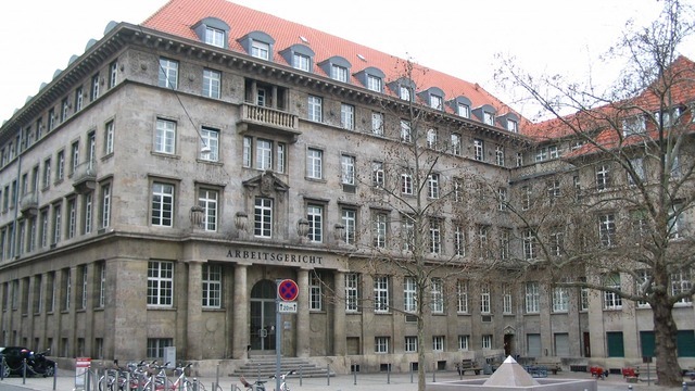 Exterior view of Stuttgart Labor Court with classic architecture and a distinctive facade.