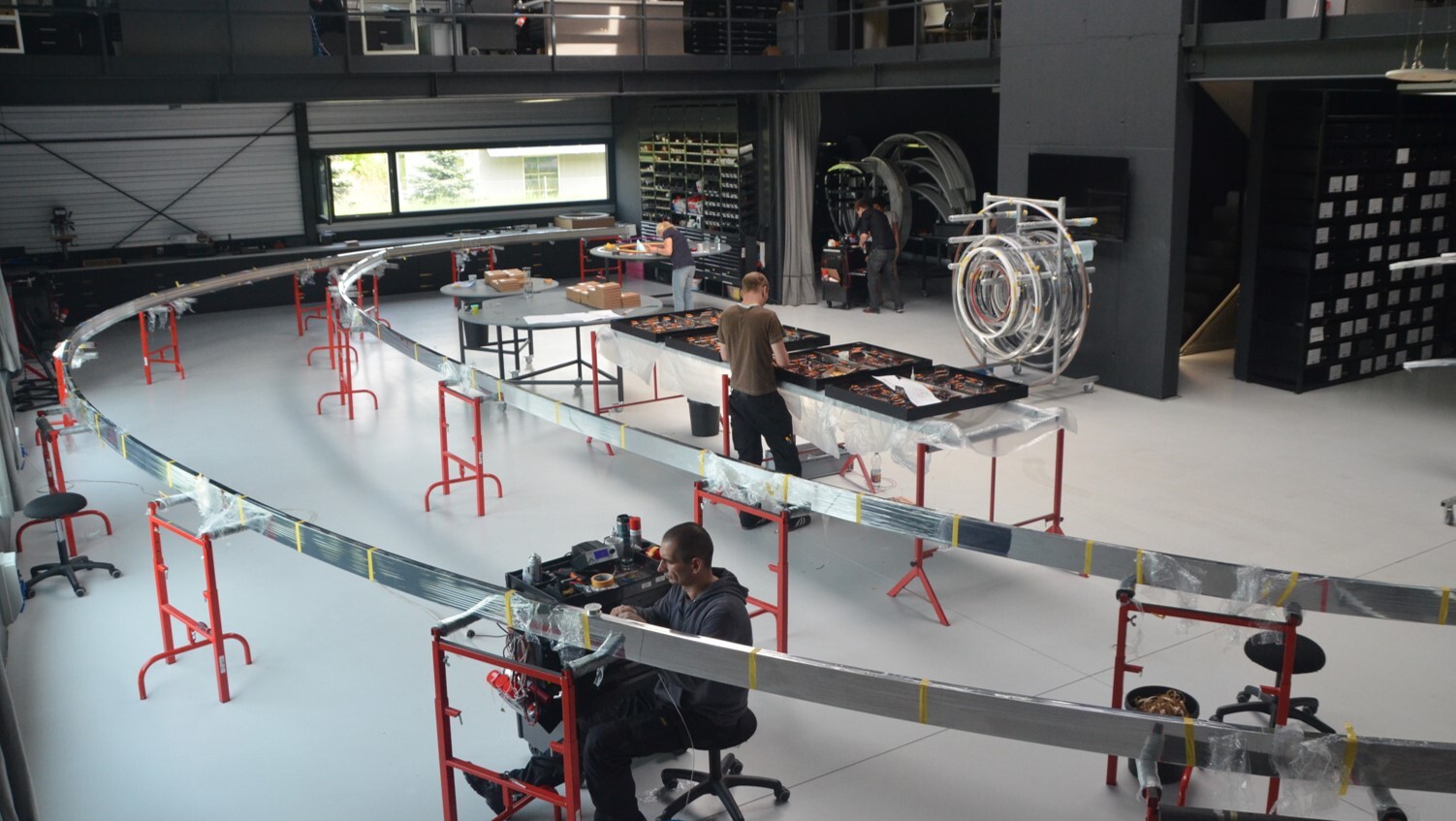 custom luminaire in development and production in manufactory as large-scale custom construction