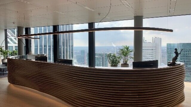 Reception area Omni Tower Frankfurt with linear pendant lights